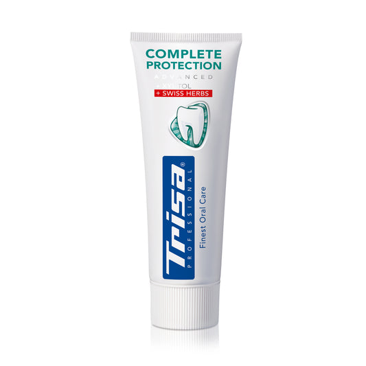 TRISA Complete Protection Swiss Herbs toothpaste tube with herbal formula and fluoride protection